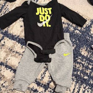 Nike Kids Black and Gray Bodysuit with Yellow Accents